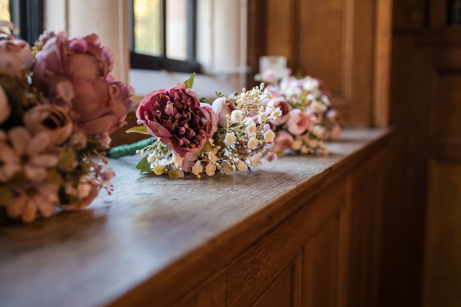 Dusky pink wedding floral arrangements