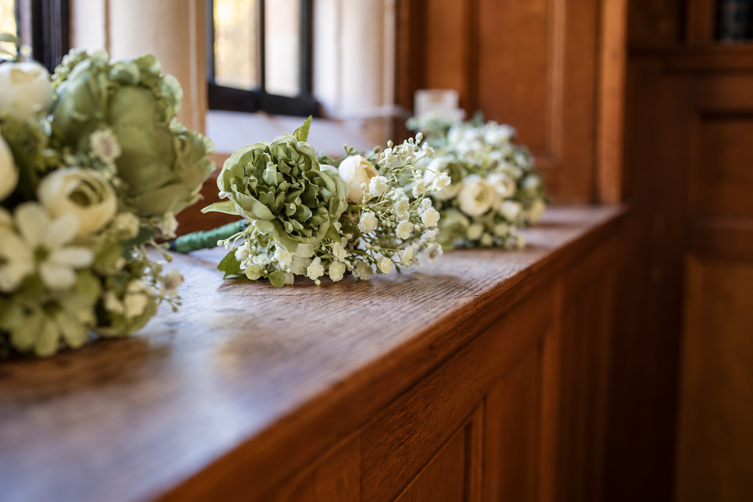 Sage green and ivory bridesmaid flowers